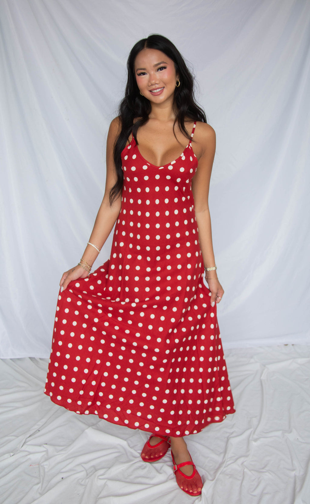lady in the polka dot dress all we do maxi Woman in bright red polka