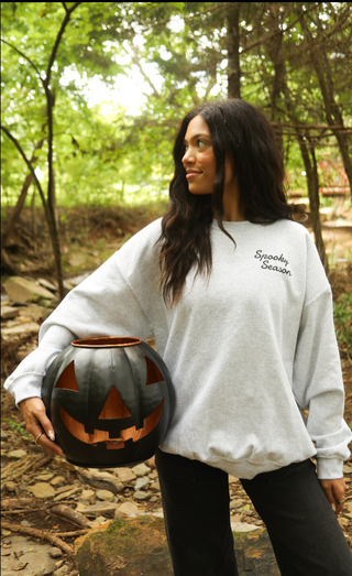 friday + saturday: spooky season sticker sweatshirt