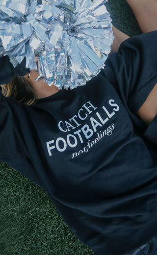 friday + saturday: catch footballs sweatshirt