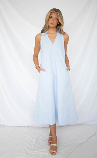 Women wearing light blue collared v-neck maxi dress. 