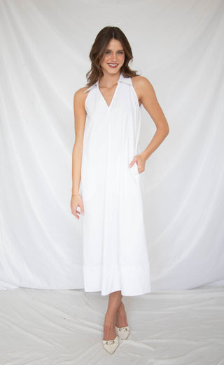 Women wearing white collared v-neck maxi dress. 
