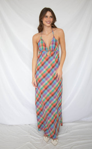 Women wearing multicolored plaid midi dress. 