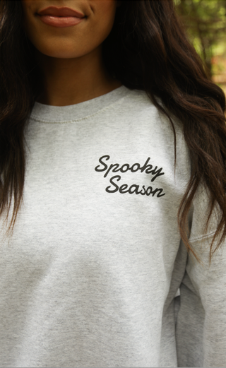 friday + saturday: spooky season sticker sweatshirt