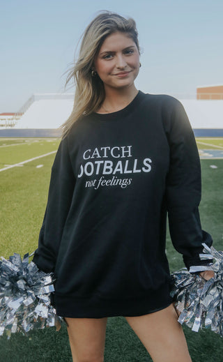 friday + saturday: catch footballs sweatshirt