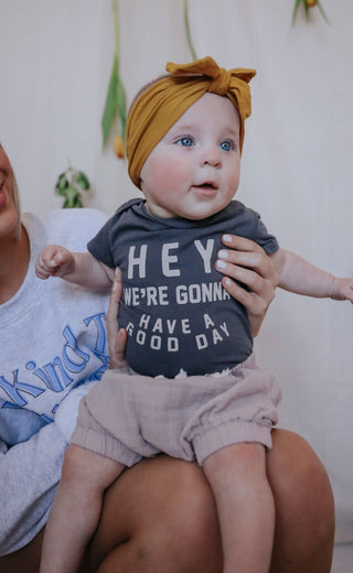 charlie southern: have a good day baby onesie